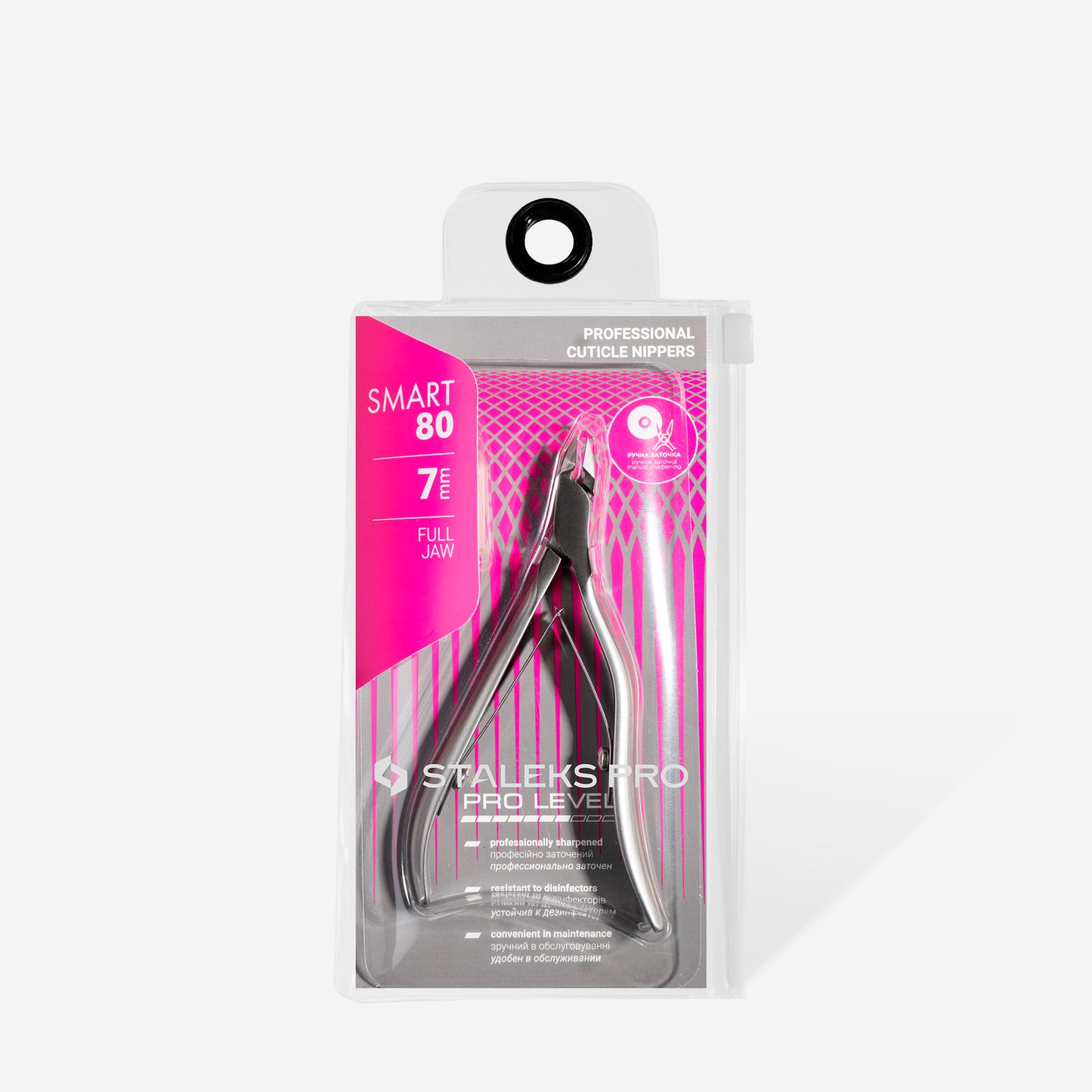 The STALEKS PRO Professional cuticle nippers SMART 80 7 mm are ideal for manicure and pedicure needs, featuring a full jaw design crafted from stainless steel. The packaging showcases a stylish pink and grey design with text emphasizing their professional-grade quality.