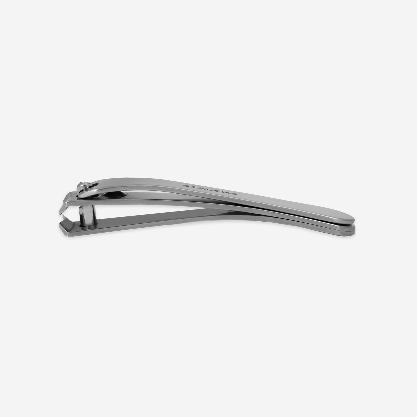 The STALEKS Nail Clipper Large BEAUTY & CARE 11 by Staleks is essential for home nail care, featuring a curved handle and a small file attachment, set against a plain white background.