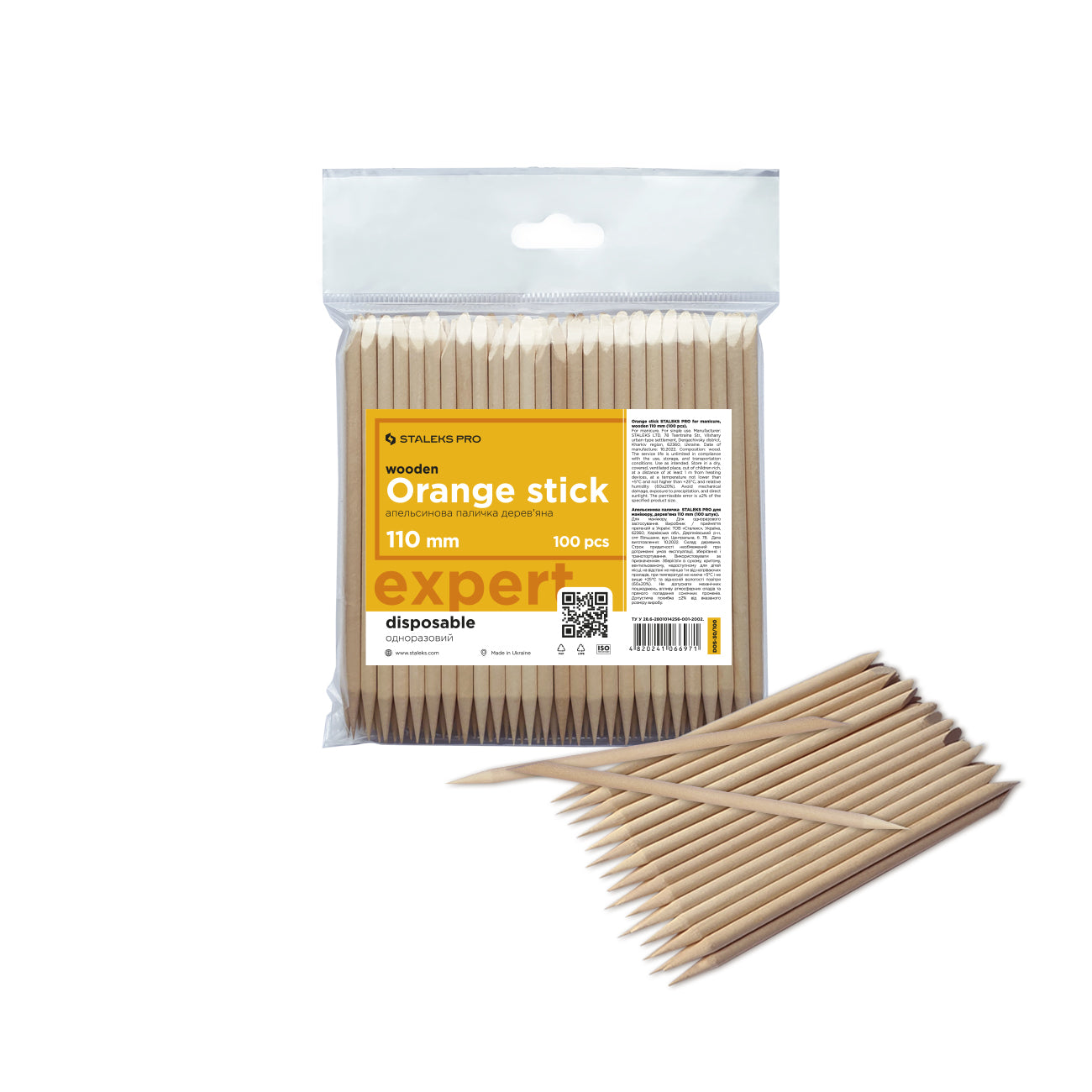 A package of 100 Staleks PRO Orange sticks for manicure wooden 110 mm in length, displayed alongside a loose arrangement of several sticks outside the package.