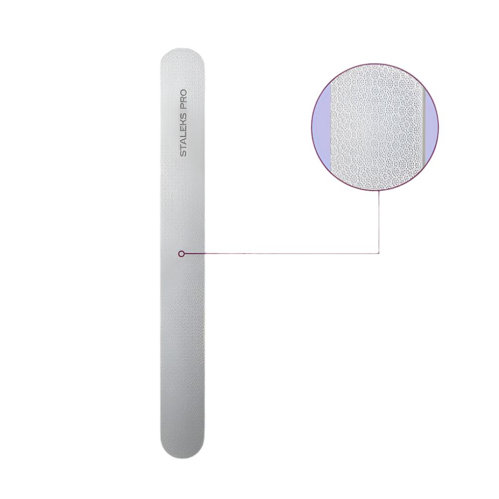 A white Staleks PRO Laser Nail File EXPERT 10, 165 mm, is shown with a circular close-up of its textured surface, perfect for professional manicures and pedicures. The plain background highlights the branded file.