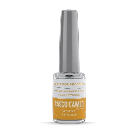 A bottle of TROP CARE Casco De Cavalo Hardening Base features a silver cap and a yellow label, indicating it is a nail care product made to strengthen fragile nails with Calcium and D'Panthenol.