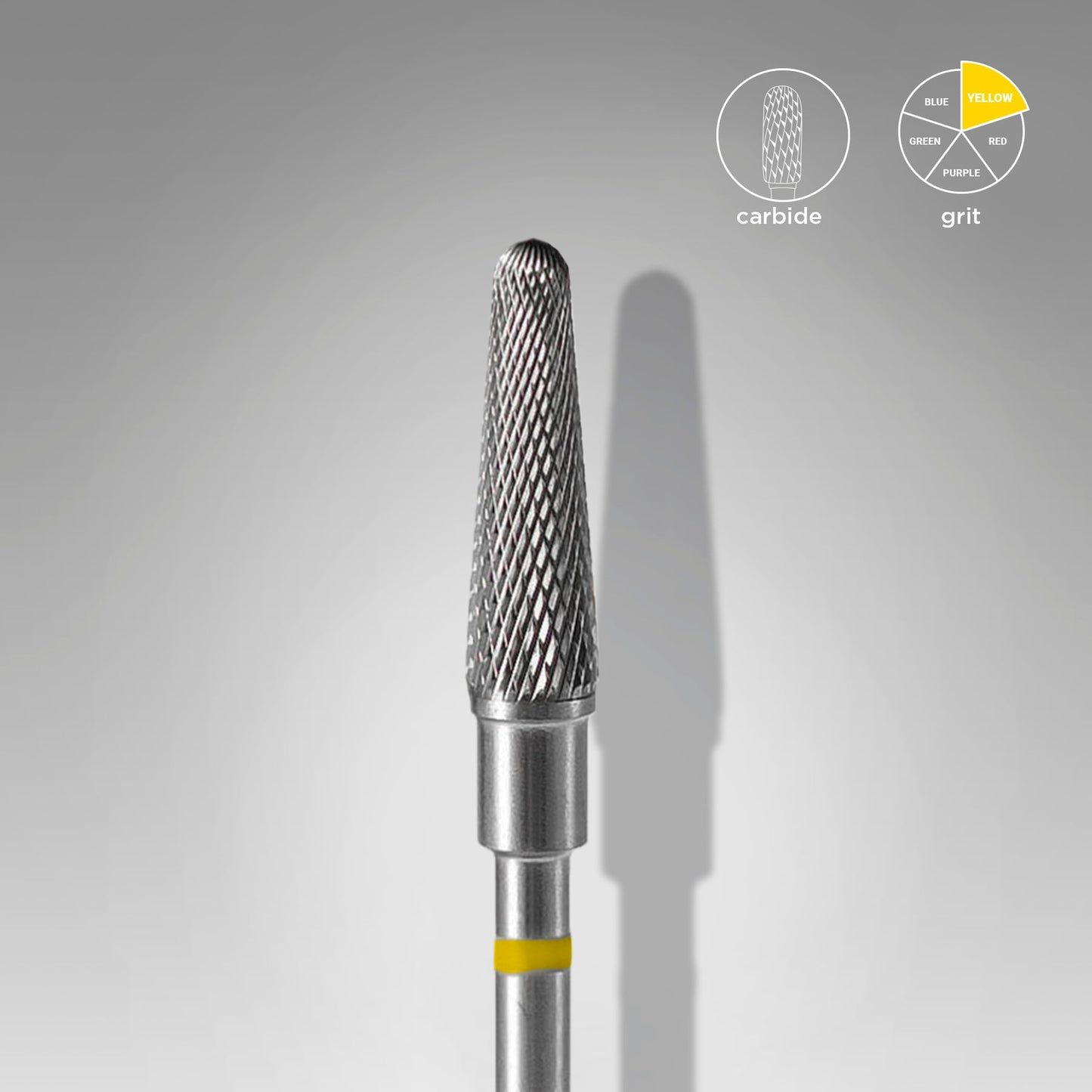 A close-up of a Staleks STALEKS PRO Carbide Nail Drill Bit (Frustum) Yellow, with a textured surface, displayed against a soft gray background, highlighted with labels on the type of material and grit.