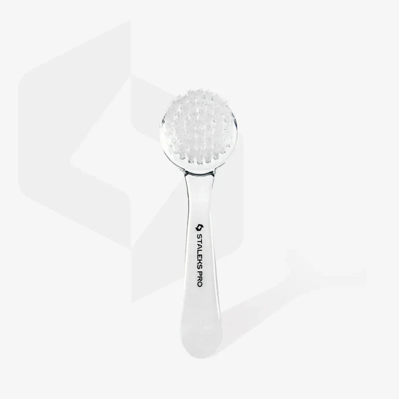 The STALEKS PRO Manicure Brush EXPERT 01 for dust removal, featuring durable synthetic bristles, a clear handle, and protective cover by Staleks, is shown against a plain white background.