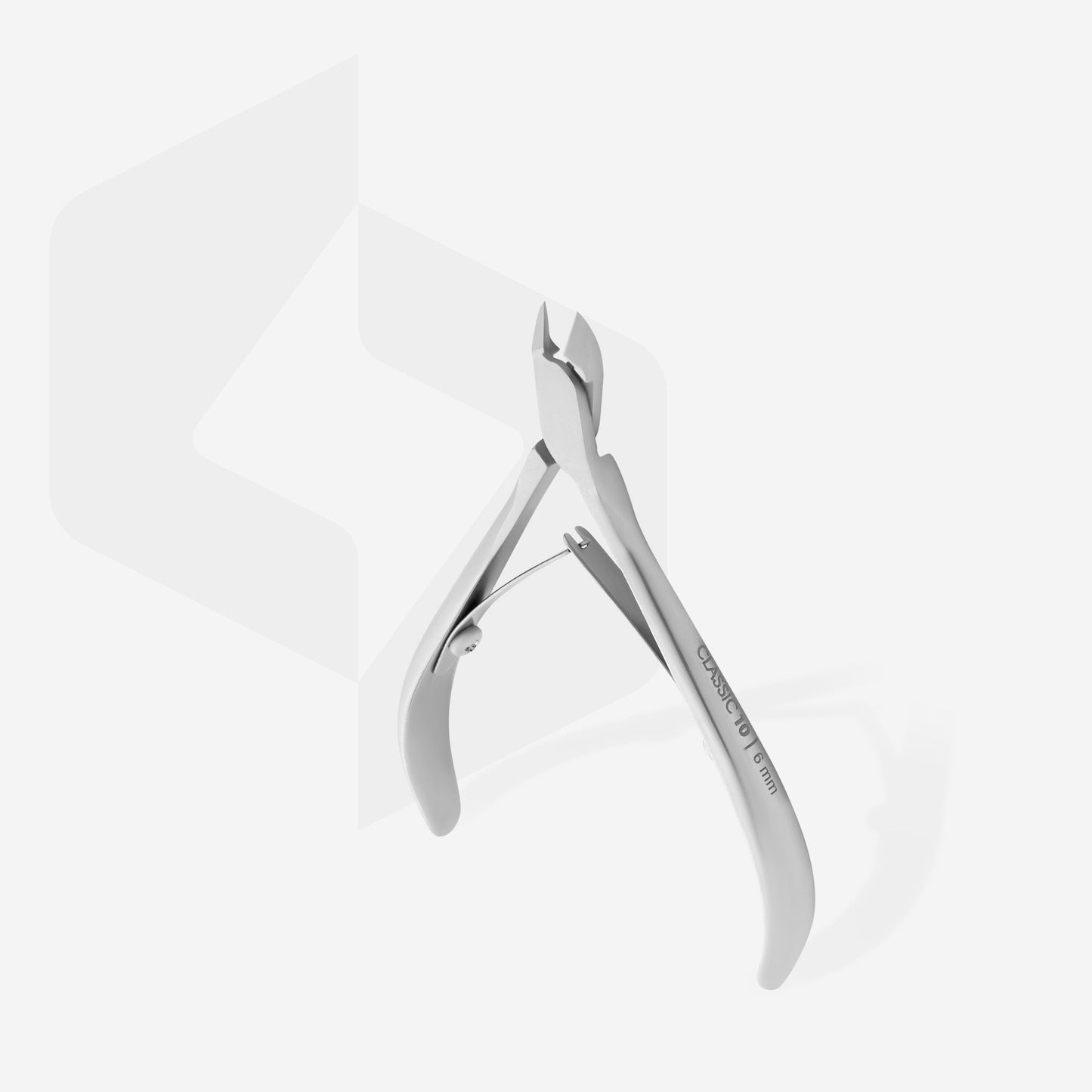 The STALEKS PRO Cuticle Nippers Classic 10, featuring a 6 mm jaw and crafted from durable AISI 420 steel, stand upright against a light gray backdrop. Their ergonomic design and curved handles offer precise grooming with every use.