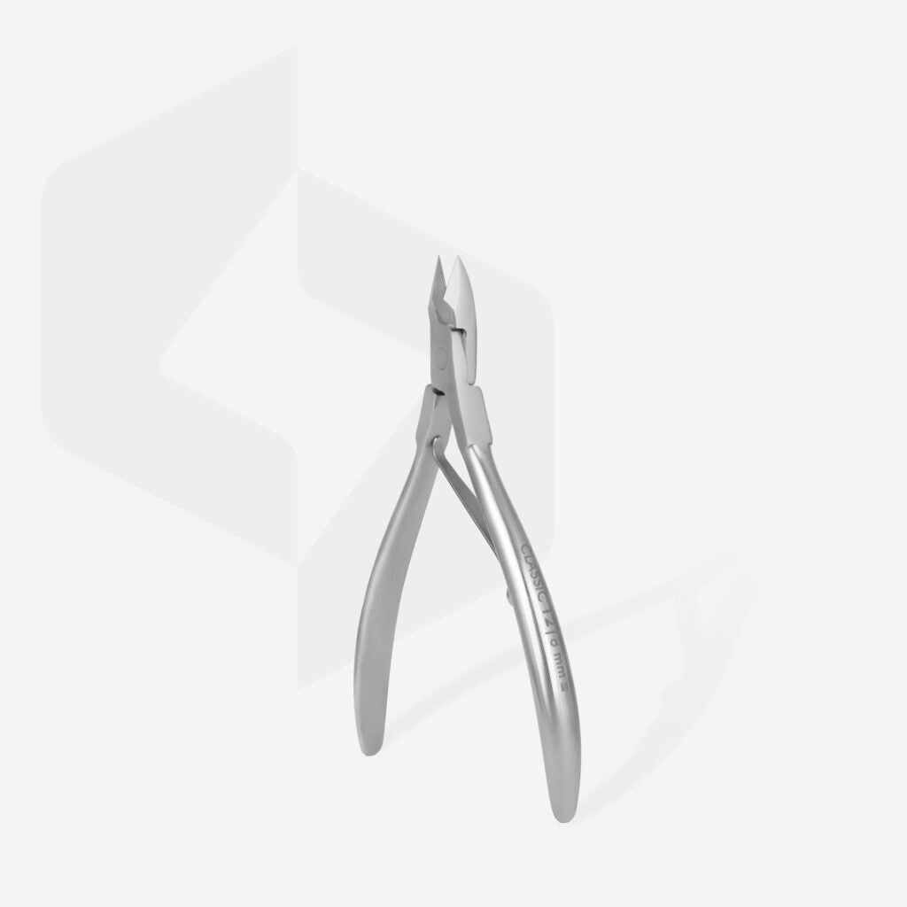 The Staleks STALEKS PRO Cuticle Nippers CLASSIC 12 8 mm, made of stainless steel with an ergonomic design and sharp, pointed blades, stand upright on a white background—perfect for precise manicure and pedicure care.