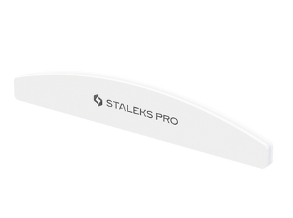 A white, crescent-shaped STALEKS PRO Grinding Buff EXPERT 41 nail file (100/180 grit, 10 pcs) with the Staleks logo in black is shown on a white background.