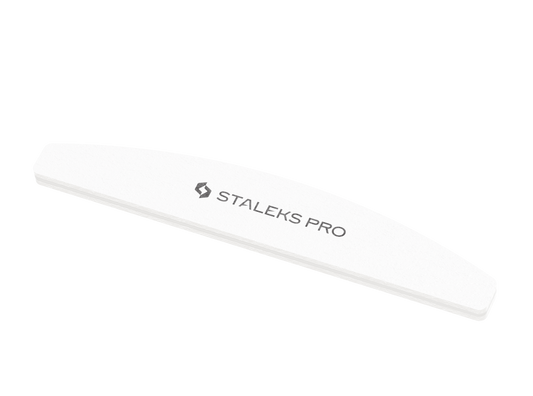 The STALEKS PRO Grinding Buff crescent EXPERT 41 100/180 grit (10 pcs) features a white, curved-edge design with "Staleks" branding, ideal for smoothing artificial nails thanks to its fine abrasive coating.
