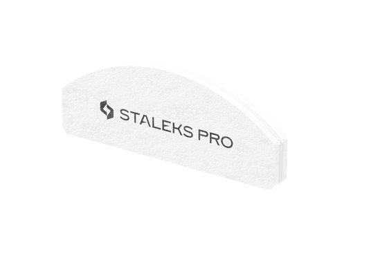 A white, semi-circular nail buffer block labeled "STALEKS PRO," the Grinding Buff Crescent mini EXPERT 41 by Staleks, with 100/180 grit abrasive coating. Set includes 20 pieces.
