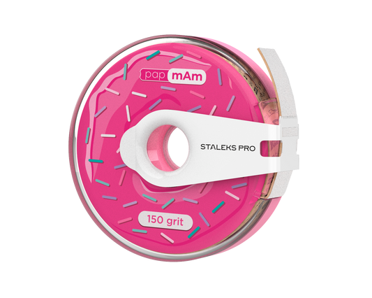 A pink donut-shaped nail file with colorful sprinkles, labeled "Staleks" and "papMam," featuring a high-quality abrasive 150 grit measurement and a white handle.