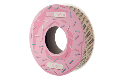 A pink donut-shaped sanding disc with colorful sprinkles, labeled "180 grit," designed to mimic a glazed sprinkled donut, ideal for manicure tools, with STALEKS PRO papMam White Disposable Abrasive Tape File EXPERT (Without Plastic Case) Atsc brand names along