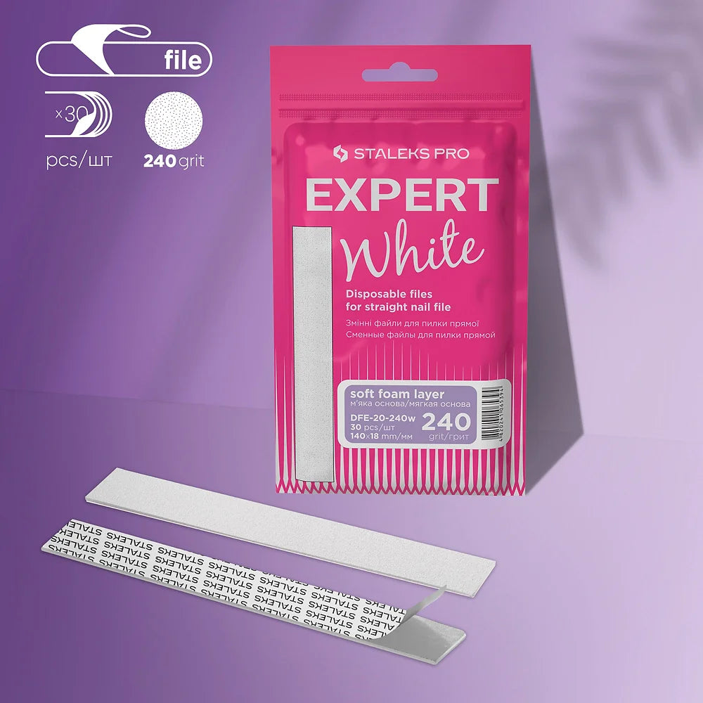 A pink packet labeled "Staleks PRO Disposable White Files for Straight Nail File on a Soft Foam Layer Expert 20 (30 pcs)" with 240 grit is shown alongside two white files—one displaying the soft foam layer, the other its adhesive backing and text.
