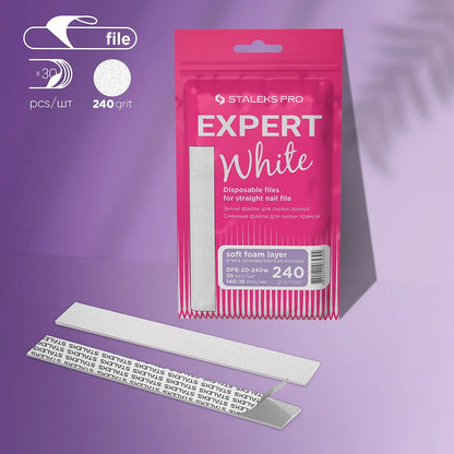 A pink packet labeled "Staleks PRO Disposable White Files for Straight Nail File on a Soft Foam Layer Expert 20 (30 pcs)" with 240 grit is shown alongside two white files—one displaying the soft foam layer, the other its adhesive backing and text.