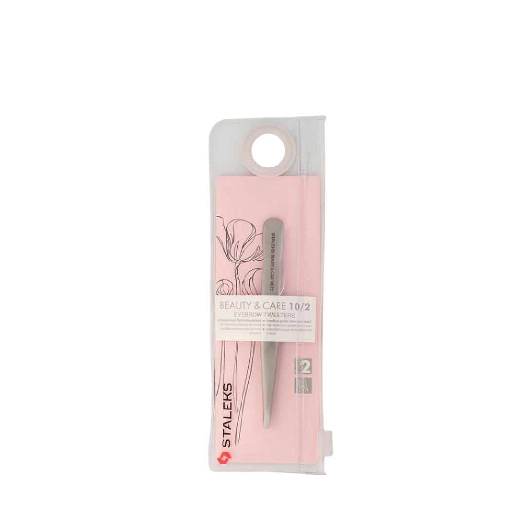 The STALEKS PRO Eyebrow Tweezers Beauty & Care 10 Type 2 by Staleks come in a pink and clear pouch with floral design, labeled "Beauty & Care 10/2"—ideal for shaping even thick eyebrows.