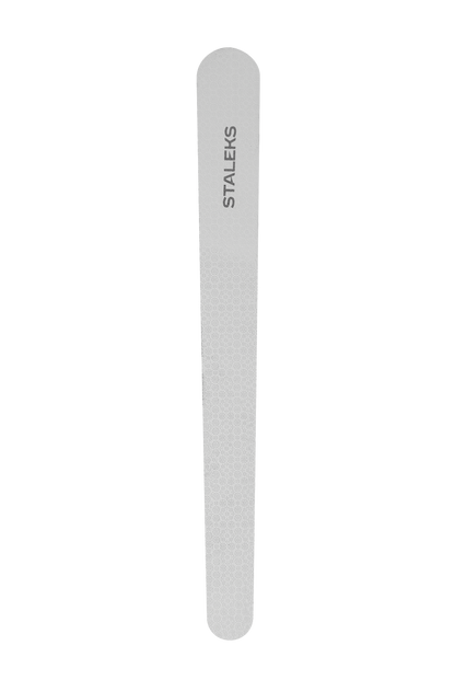 The STALEKS PRO Laser Nail File BEAUTY & CARE 20 (110 mm) is a single gray stainless steel file with a rounded end, featuring the Staleks logo vertically near the top—perfect for precise manicures and pedicures.