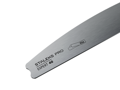 A close-up of the Staleks STALEKS PRO Crescent Metal Base For Nail File EXPERT 40, engraved with the brand name and product title, displayed against a black background.