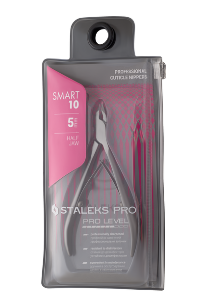 A package of STALEKS PRO Professional cuticle nippers SMART 10 5 mm is displayed. The transparent pouch showcases the stainless steel tool inside, with "Professional Cuticle Nippers," "5 mm," and "Half Jaw" prominently featured on the red and white packaging from Staleks.