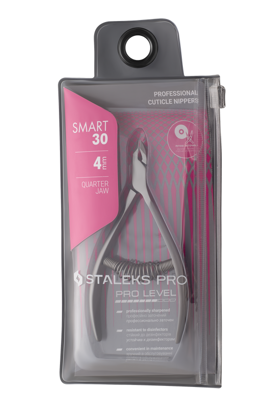 The image features STALEKS PRO Professional Cuticle Nippers, a sleek stainless steel tool with a 4 mm jaw. The gray packaging with pink accents has a hanging tab and zip closure, highlighting the precision of Staleks' manually sharpened nippers.