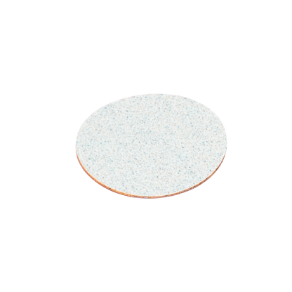 The STALEKS PRO Disposable files for pedicure disc PODODISC L EXPERT (25mm, 50pcs) by Staleks feature single round discs with a light color and speckled abrasive grit texture, shown isolated on a white background.