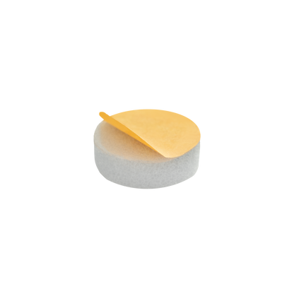 The Staleks STALEKS PRO Disposable Files-Sponges For Pedicure Disc PODODISC S EXPERT 15 (25 pcs) are round, white foam pads with yellow adhesive backing, ideal for smooth feet when used with a pedicure file.