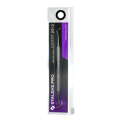 A STALEKS PRO Pedicure Curette EXPERT 20 TYPE 2 (Double-Ended Curette) by Staleks is visible in a clear, rectangular, resealable plastic package with black, white, and purple accents. Ideal for ingrown nail care.