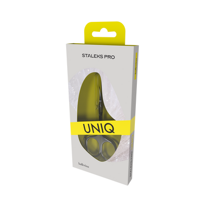 A box of Staleks STALEKS PRO Professional Cuticle Scissors Ballerina UNIQ 10 TYPE 3 in stainless steel, featuring a yellow and white design with a clear window and "UNIQ" boldly printed on the front.