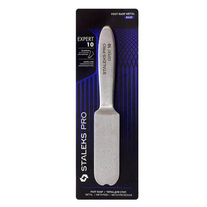 The STALEKS PRO Metal Base for Pedicure Grater EXPERT 10 by Staleks is shown in black and blue packaging, displaying the full rectangular abrasive surface, handle, and clear product branding and description.