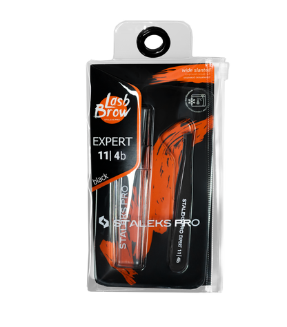 The STALEKS PRO Eyebrow Tweezers Black EXPERT 11 TYPE 4b (Narrow Beveled) by Staleks come in black packaging with orange accents and a transparent front that showcases the tweezers inside.