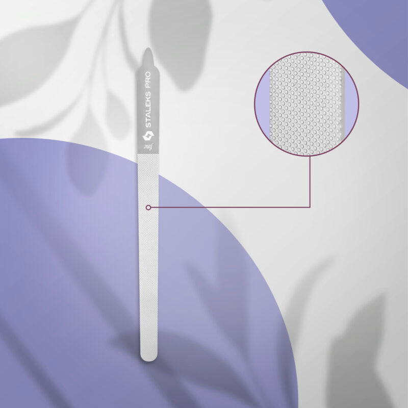 The STALEKS PRO Laser Nail File EXPERT 11 155 mm by Staleks is displayed vertically on a purple and white abstract background, with a circular inset highlighting its fine texture for precise manicures and pedicures.