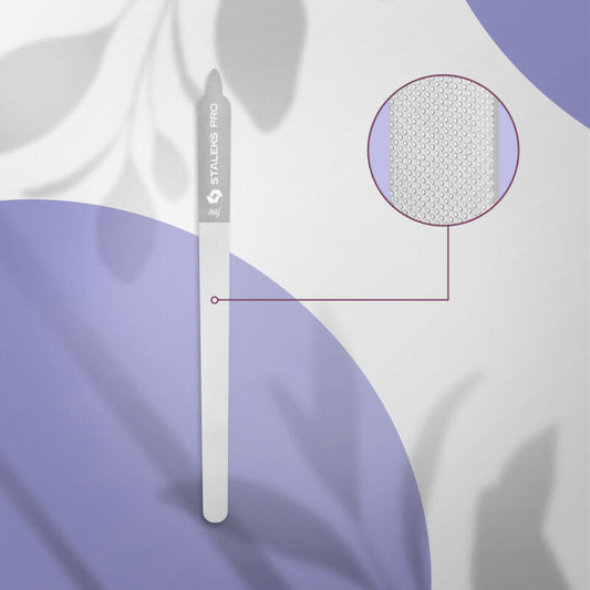 The STALEKS PRO Laser Nail File EXPERT 11 155 mm by Staleks is displayed vertically on a purple and white abstract background, with a circular inset highlighting its fine texture for precise manicures and pedicures.
