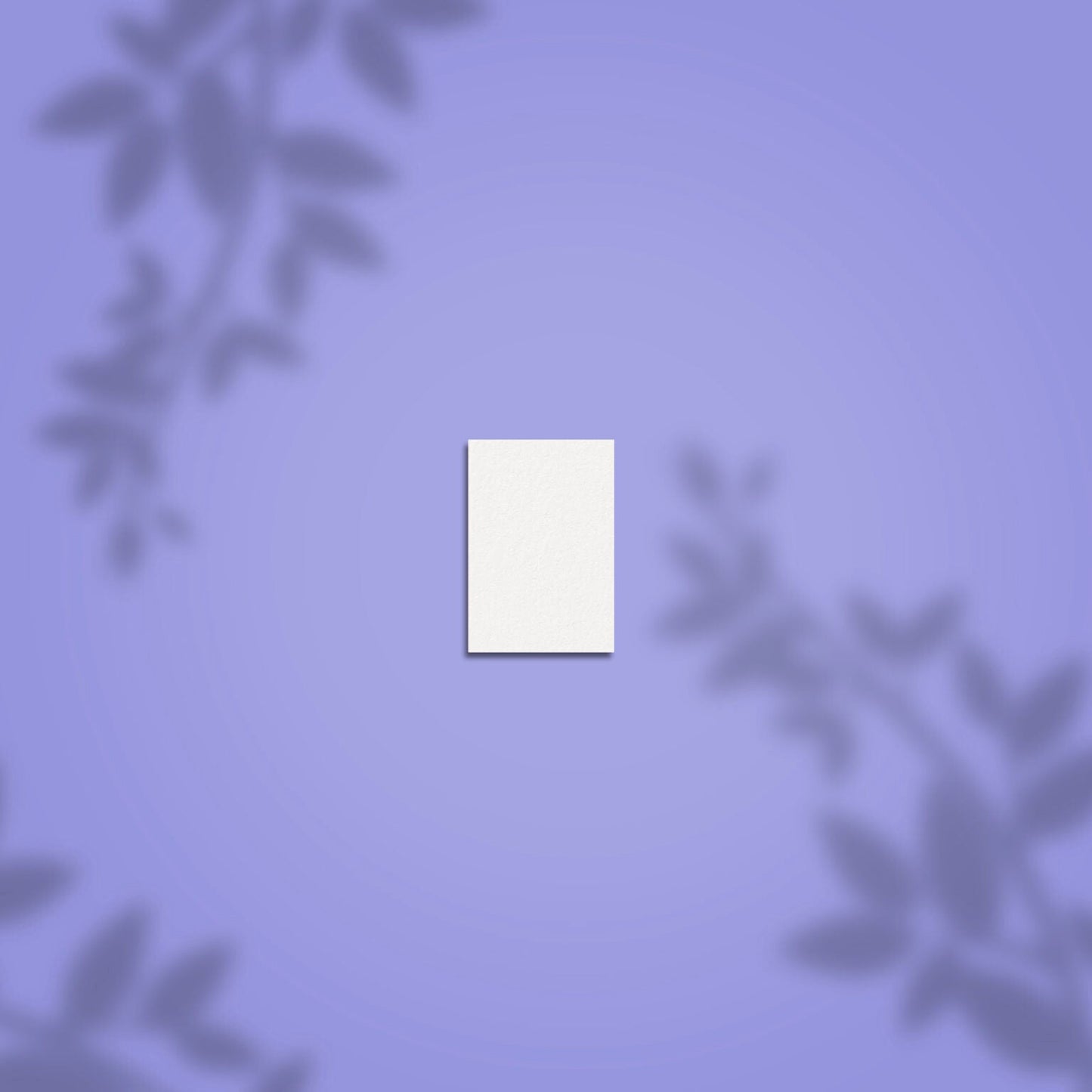 A white rectangular card, like the STALEKS PRO Grinding Buff Rectangular mini EXPERT 51 100/180 grit (50 pcs) by Staleks, is centered on a purple background with soft leafy shadows, evoking the calm minimalism of a nail buffer.