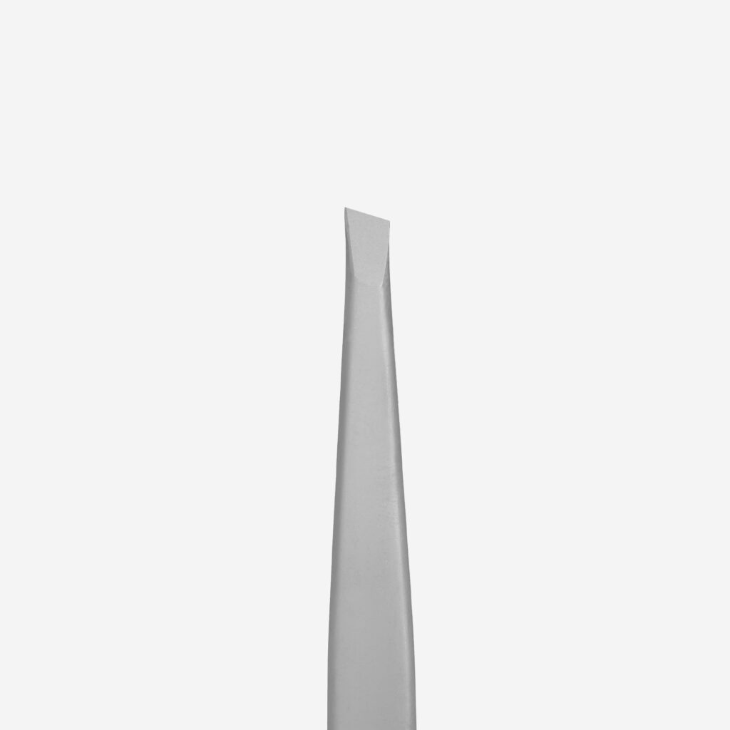 Close-up of the Staleks STALEKS PRO Eyebrow Tweezers BEAUTY & CARE 10 TYPE 3 (wide beveled) tip against a plain white background—ideal for precise shaping of thick eyebrows.