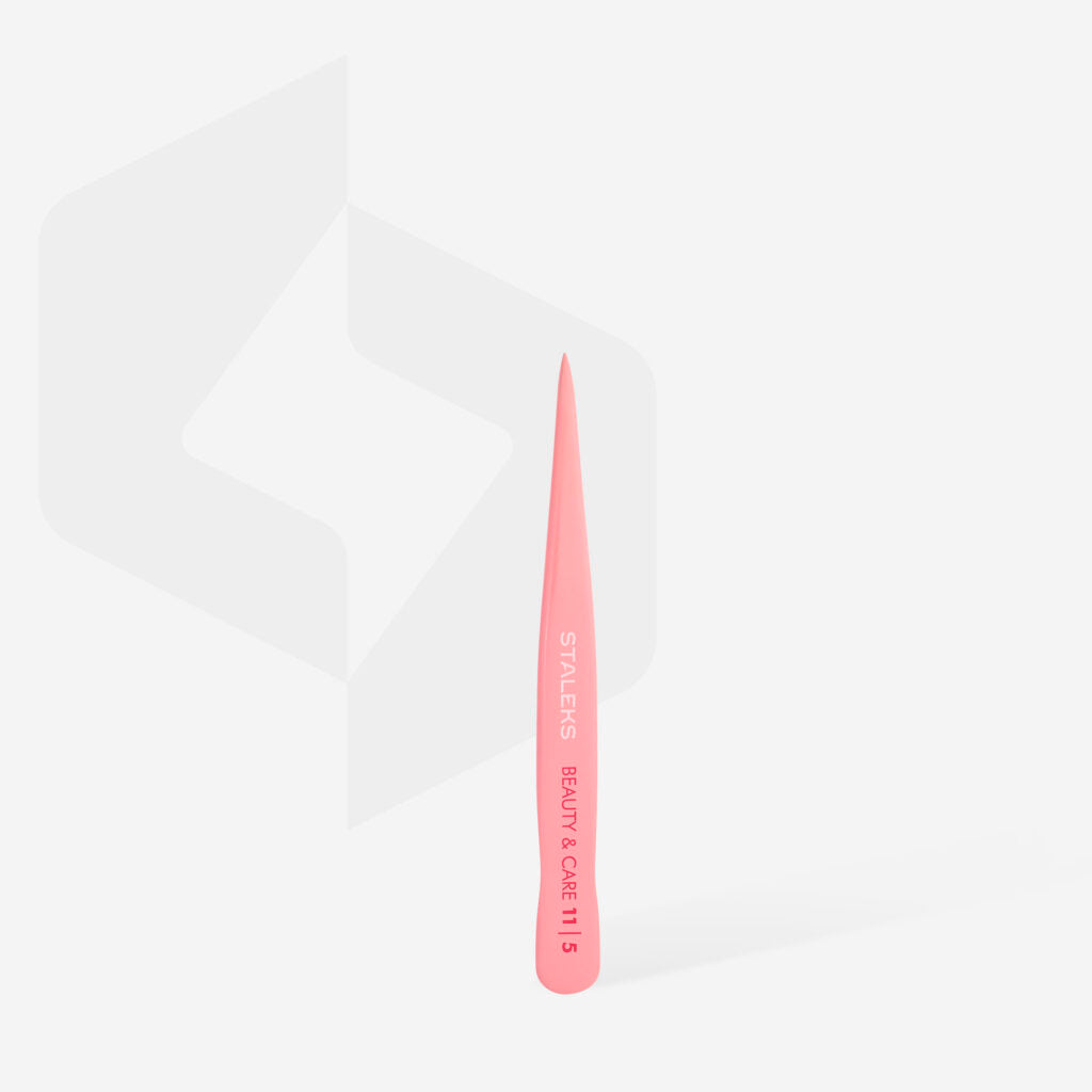 The STALEKS PRO Eyebrow Tweezers BEAUTY & CARE 11 TYPE 5 (Point) by Staleks, featuring a pink handle with pointed stainless steel tip, stands upright on a light gray background. "STALENS BEAUTY & CARE 11 5" is printed on the handle.