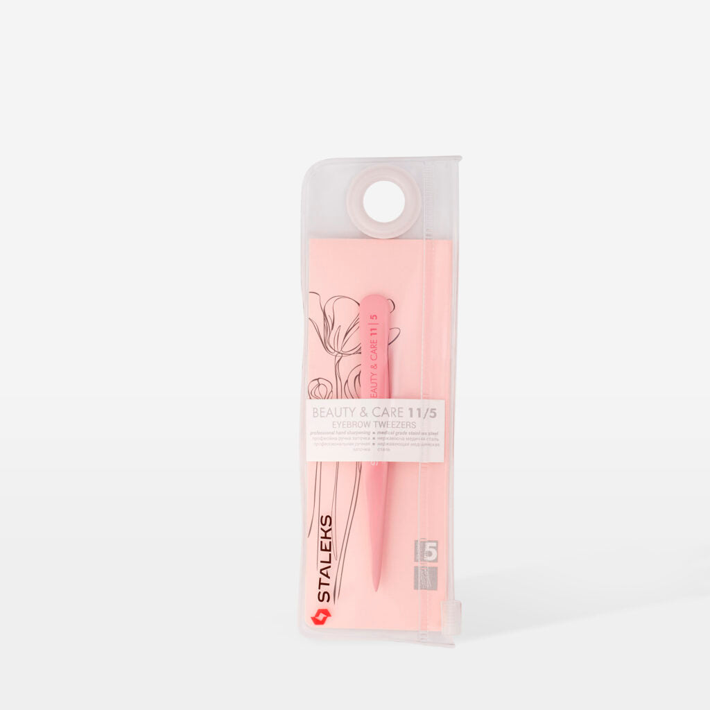 The STALEKS PRO Eyebrow Tweezers BEAUTY & CARE 11 TYPE 5 (Point) by Staleks are pink, pointed stainless steel tweezers in a clear case with a pink insert and floral line art, labeled "Beauty & Care 11/5 Eyebrow Tweezers.