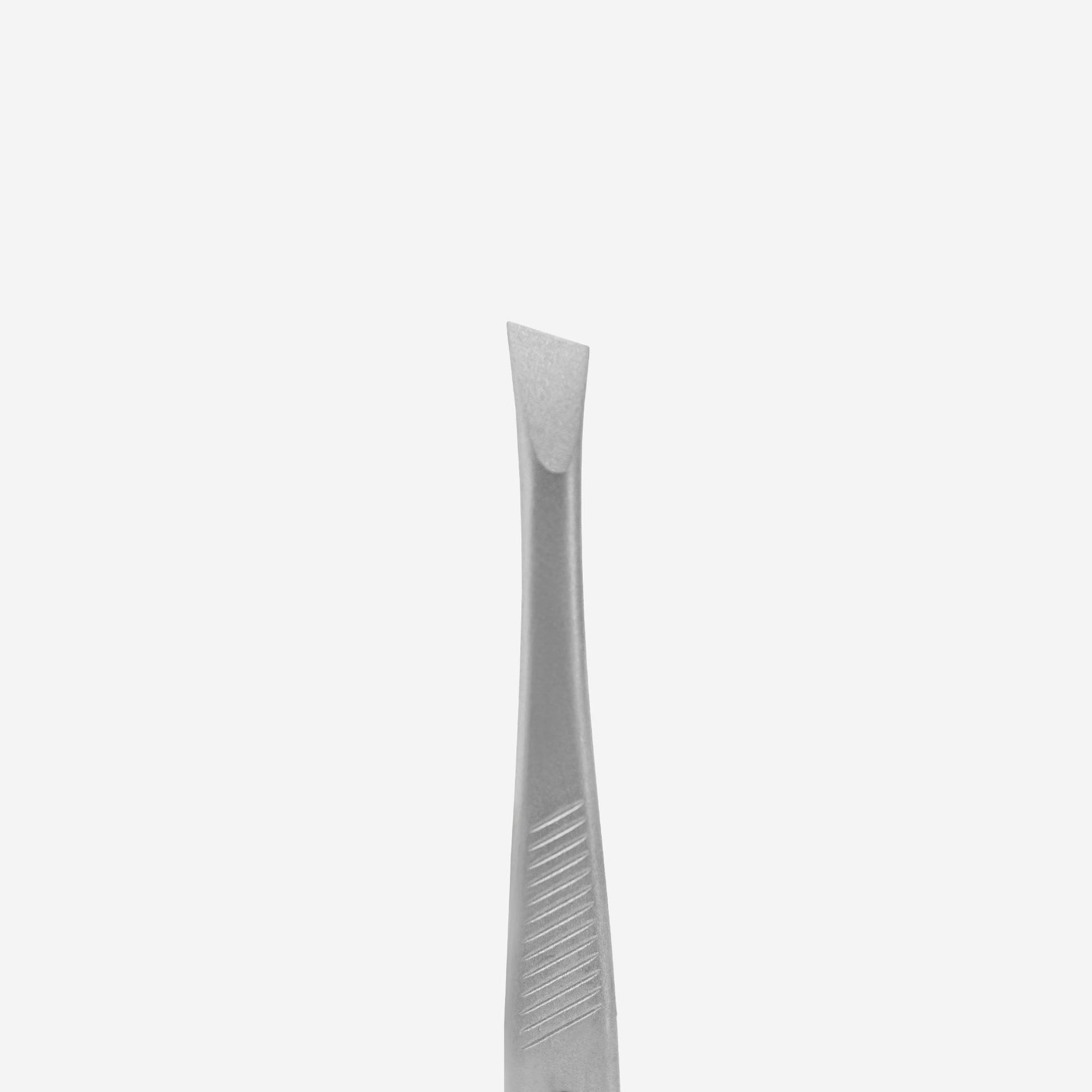 A close-up of Staleks STALEKS PRO Eyebrow Tweezers CLASSIC 10 TYPE 3 (wide beveled), made of stainless steel with a slanted tip, shown vertically against a plain white background.